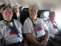 Veterans sit in a plane